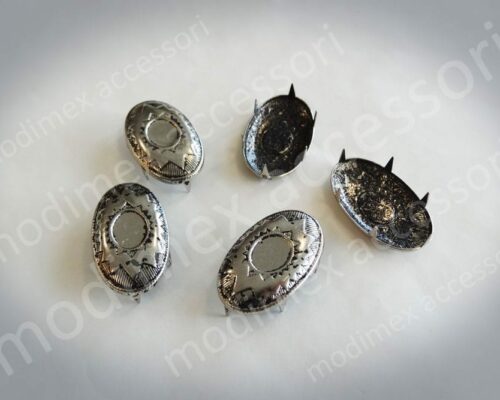 Oval nailheads with raised design art. 084