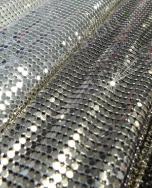 Maglie metalliche in ottone con elementi piatti